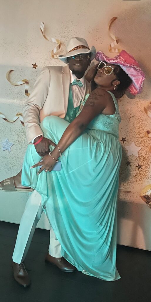 wedding guests posing for photo booth photos